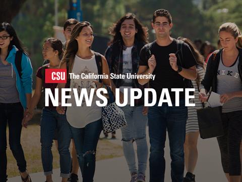 A group of students walking on campus with the copy &quot;News Update&quot; across the center.