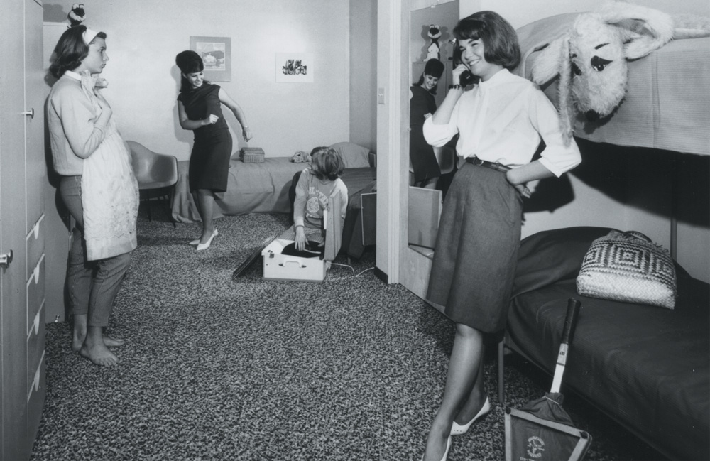 1950s   Students pose to show what dorm life was expected to be like.