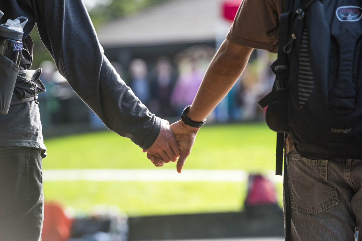 A student couple takes a walk while holding hands on February 5, 2019.