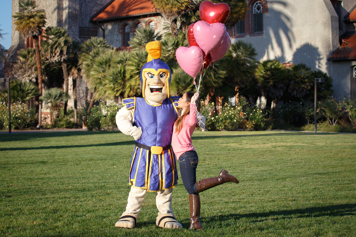 Students pose with Sammy the Spartan on the San José campus to celebrate Valentine’s Day, January 21, 2015. 